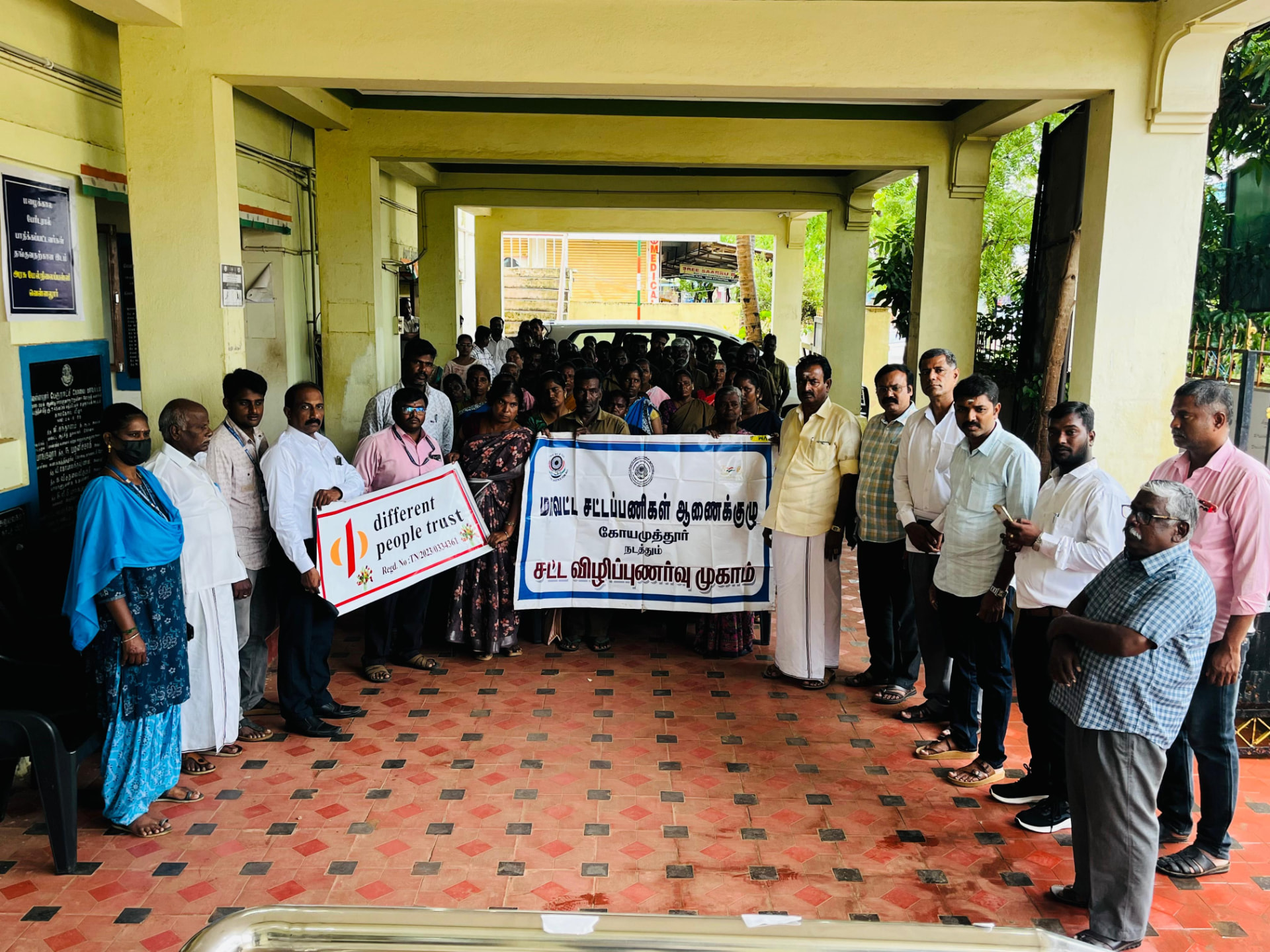 Legal awareness camp held with the trust banner at Vellalore