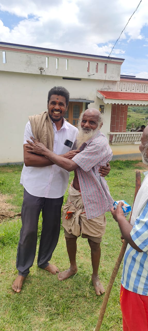 A warm meeting with an elder during a village visit